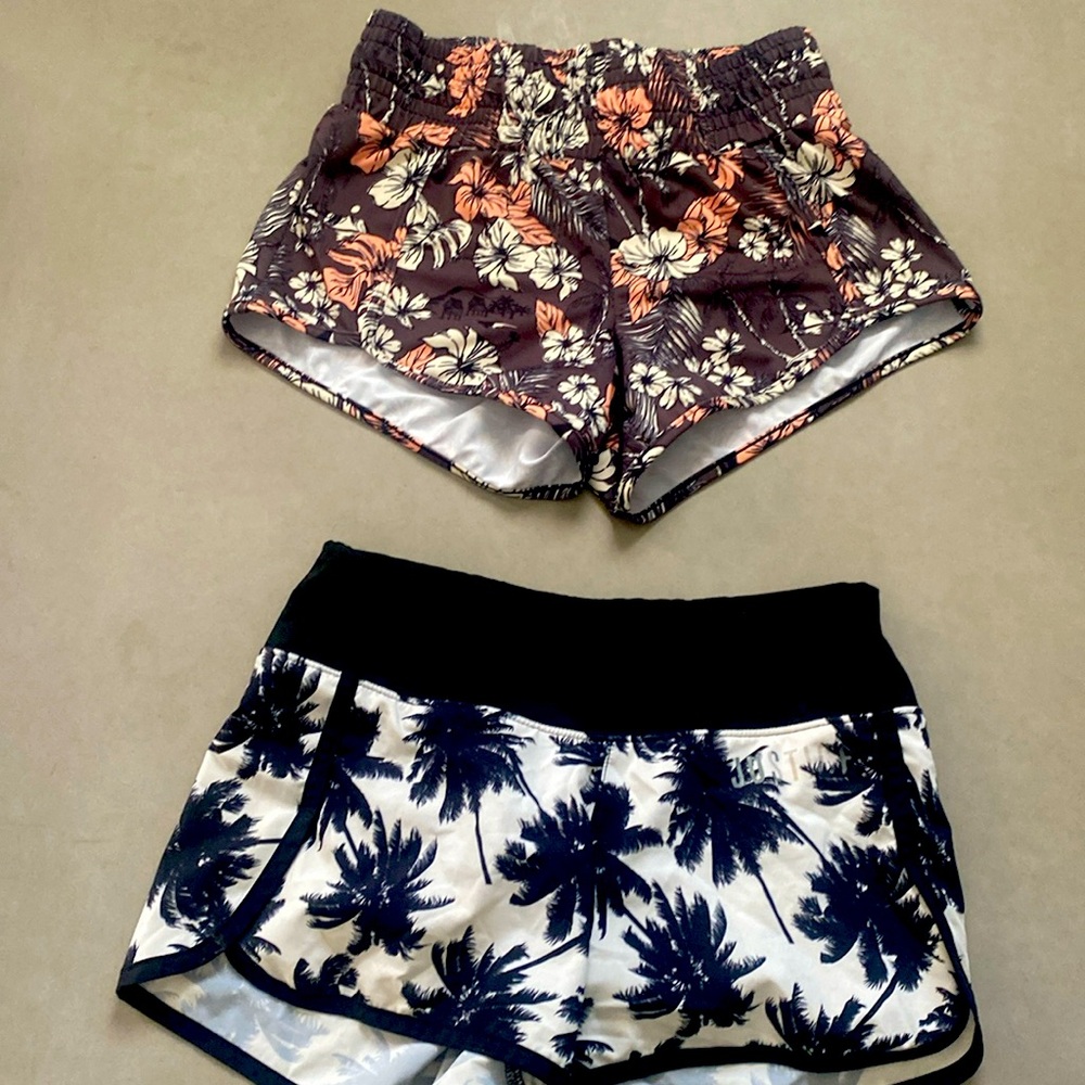 3 pairs girls athletic shorts. Rip Curl, Justice, All in Motion. Size 8